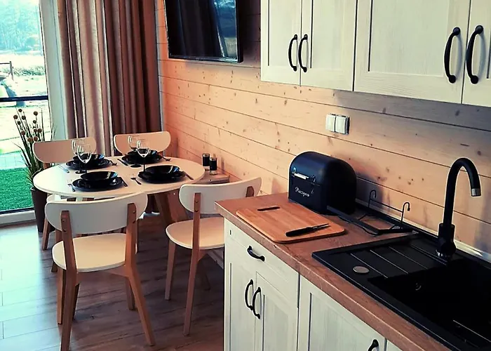 Деревянный коттедж Debowka